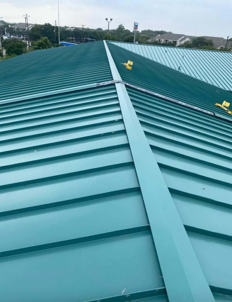 Green commercial metal roof ridge and valley for Metal Roof Repair in Windsor